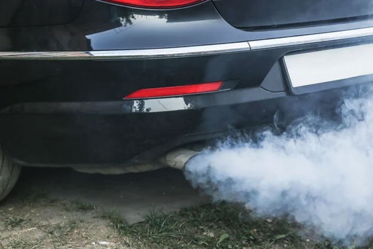 White Smoke From Your Exhaust: What It Means & How to Fix It